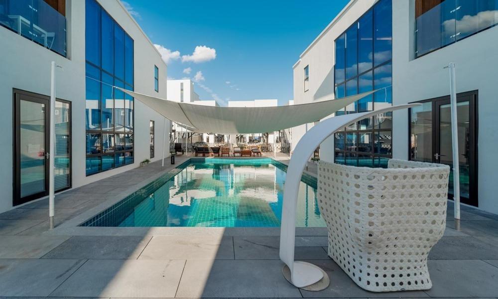 a swimming pool in the middle of a building at Aldea de Pangsion Pool Villa in Pohang