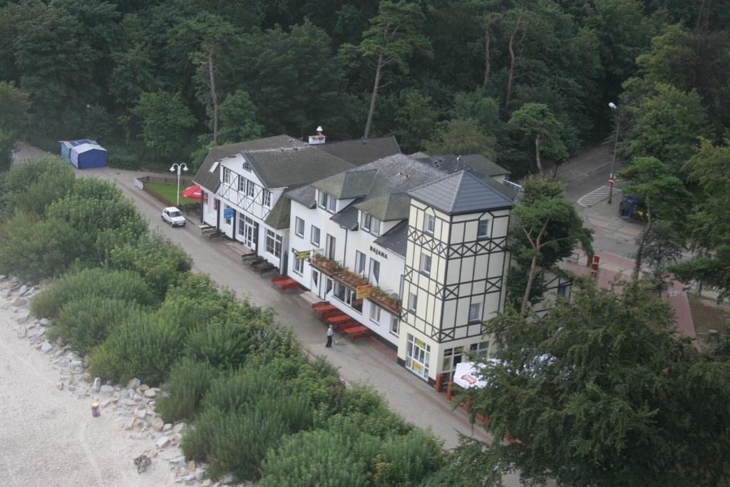 an aerial view of a large white house at Zajazd Dajana in Ustka