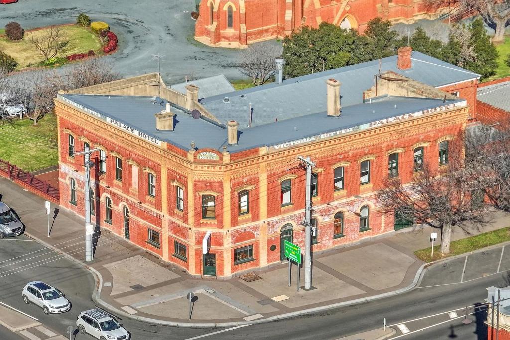 an overhead view of a large red brick building at ARK Apartments in Echuca