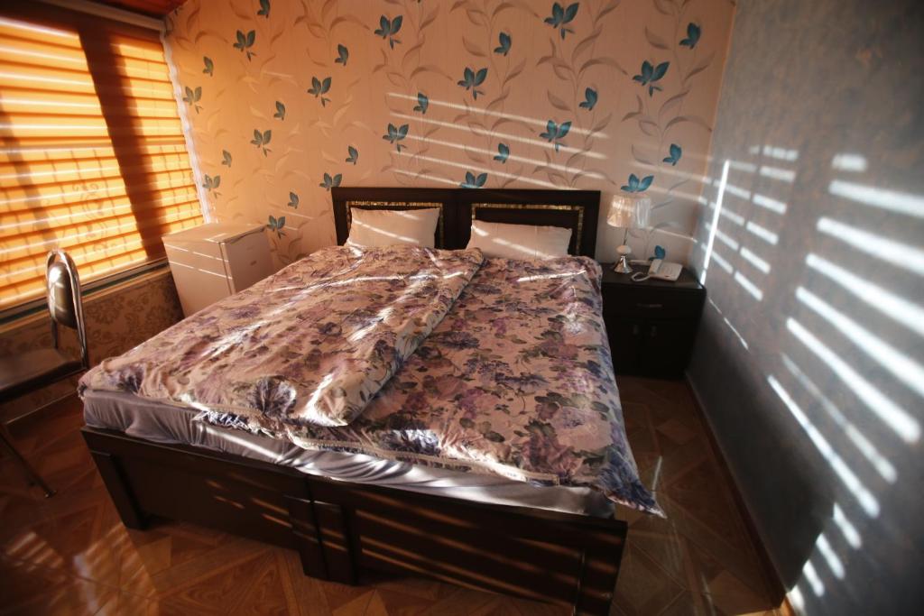 Postel nebo postele na pokoji v ubytování Isra Hotel