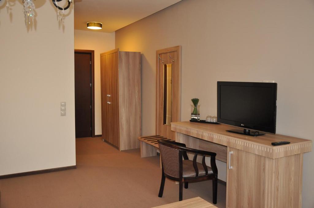 TV a/nebo společenská místnost v ubytování Hotel Rainer