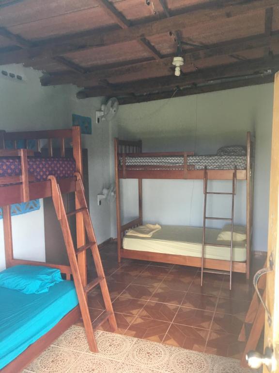 Postel nebo postele na pokoji v ubytování Johnny Fiestas