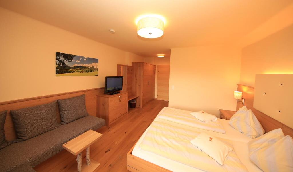 Een bed of bedden in een kamer bij Alpenperle