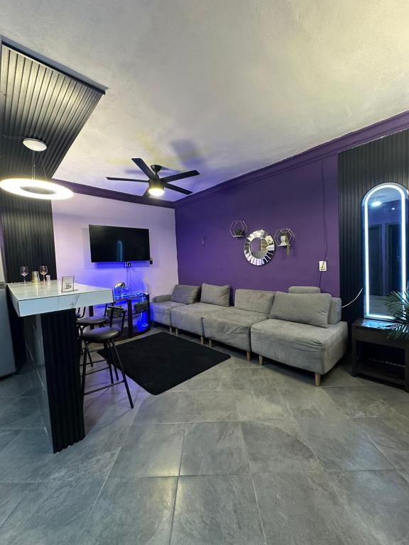 a living room with a couch and a table at Departamento Mateos 503 in Ciudad Acuña