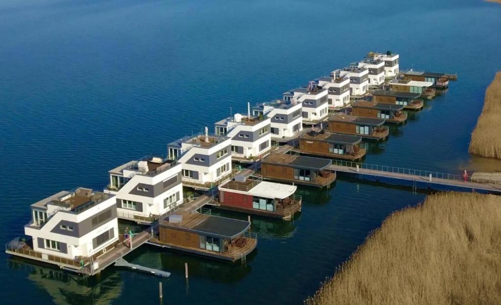 an aerial view of a bunch of boats in the water at Floating-Haus Meerferien in Bitterfeld