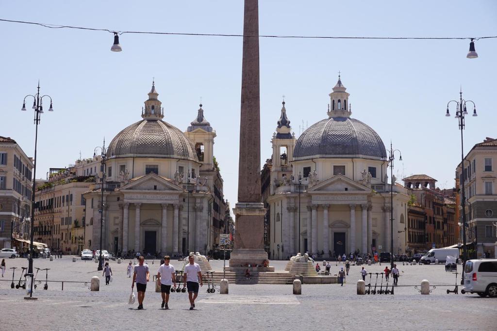 a group of people walking in front of a building at Liberty House Ten in Rome