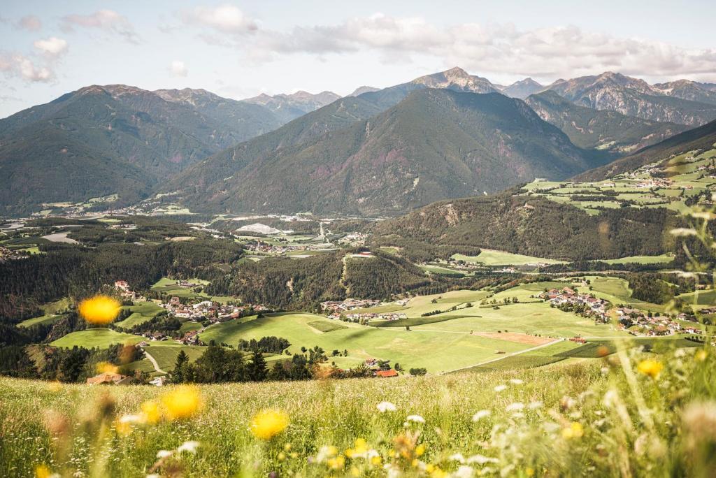 a view of a valley with mountains in the background at Obergasserhof in Rodengo