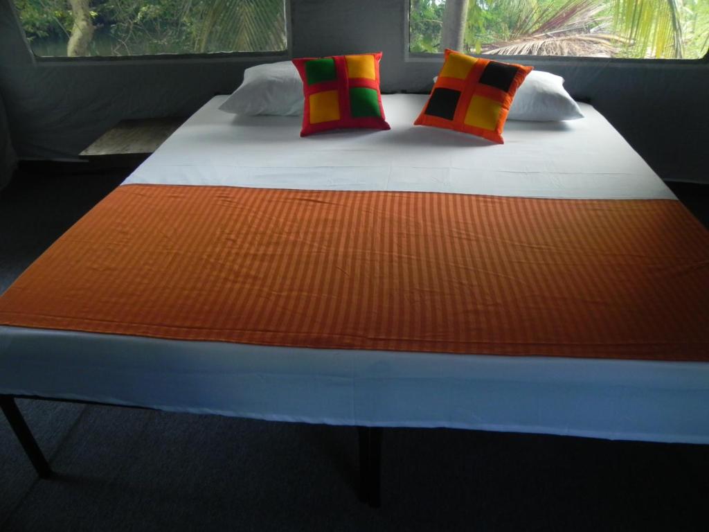 Postel nebo postele na pokoji v ubytování Makulu Safari Camping