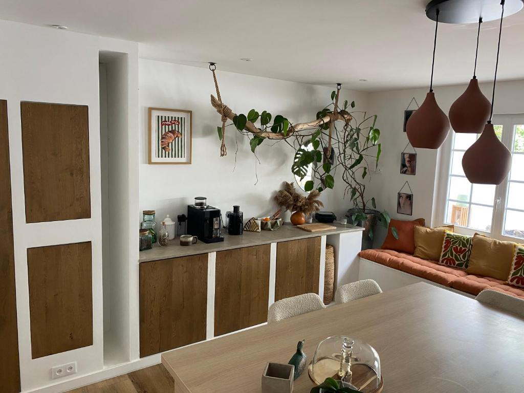 a living room with a couch and a table at Baionako extea in Bayonne