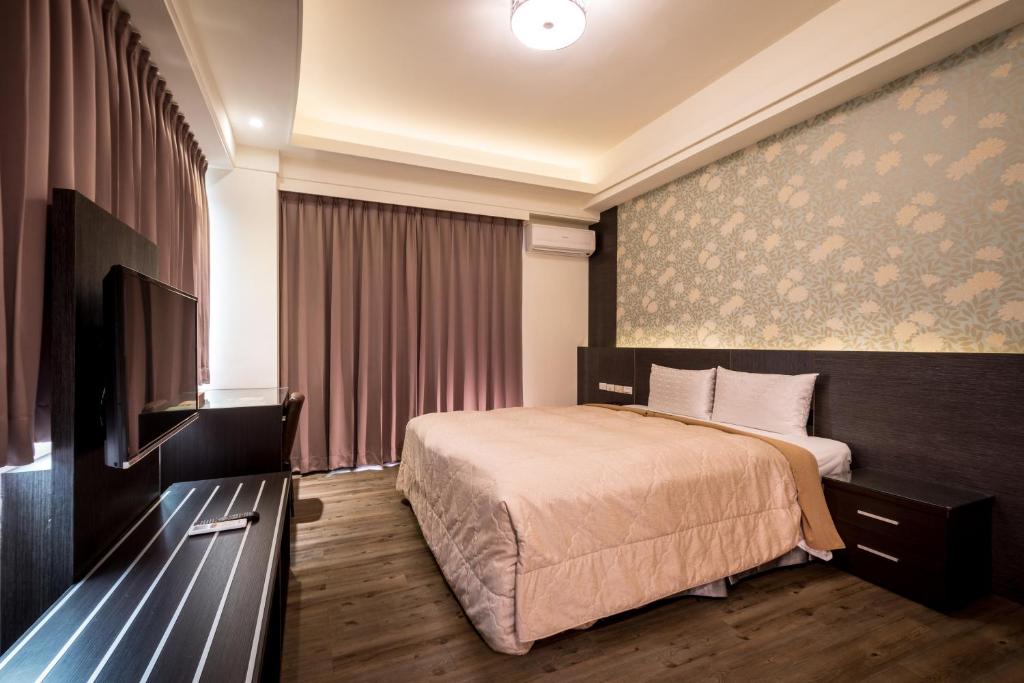 TV a/nebo společenská místnost v ubytování Yundu Business Hotel