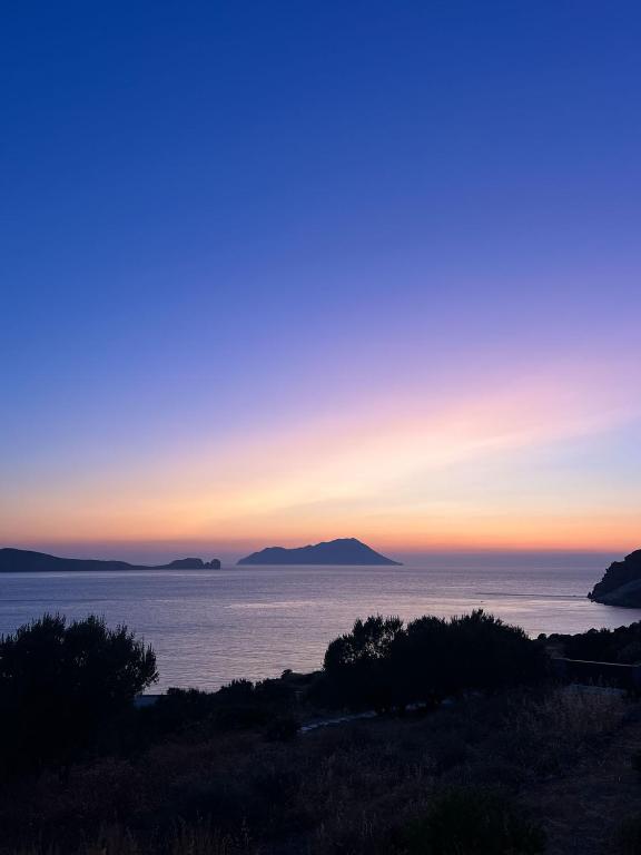 a view of the ocean at sunset at ARETI Horizon in Kástron