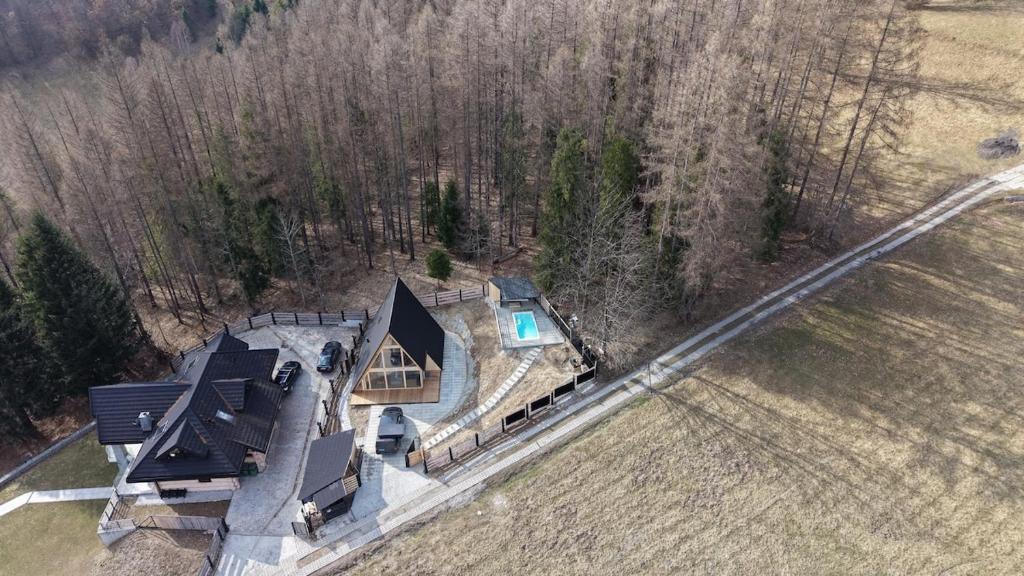 an overhead view of a house in the woods at Silva Peak House in Zawoja