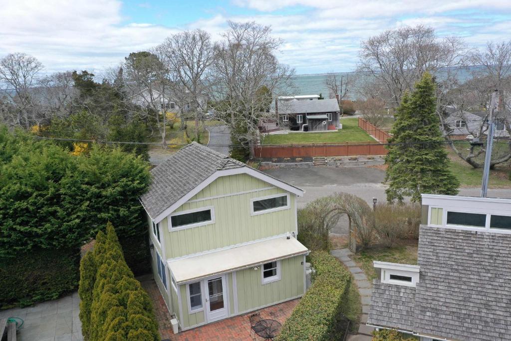 an aerial view of a house with a yard at Seabreeze #3 - Cozy cottage by the beach in Hampton Bays