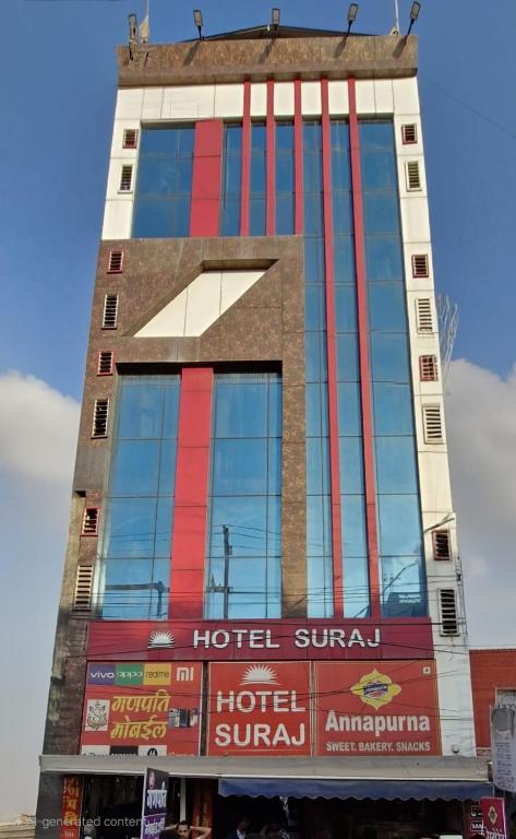 a building with a sign on the side of it at Hotel Suraj in Raxaul
