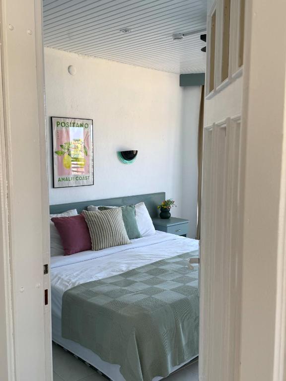 a bedroom with a bed in a room at Cleo Hotel in Alanya