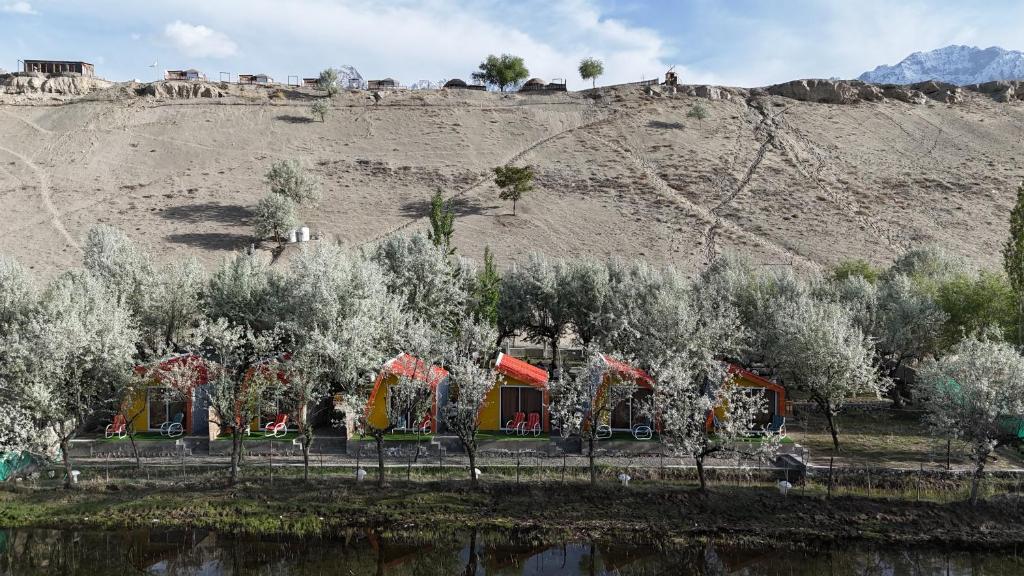 a playground on the side of a hill at MONTAGNA PODS,Best resort in skardu , Best Guest house In skardu in Skardu