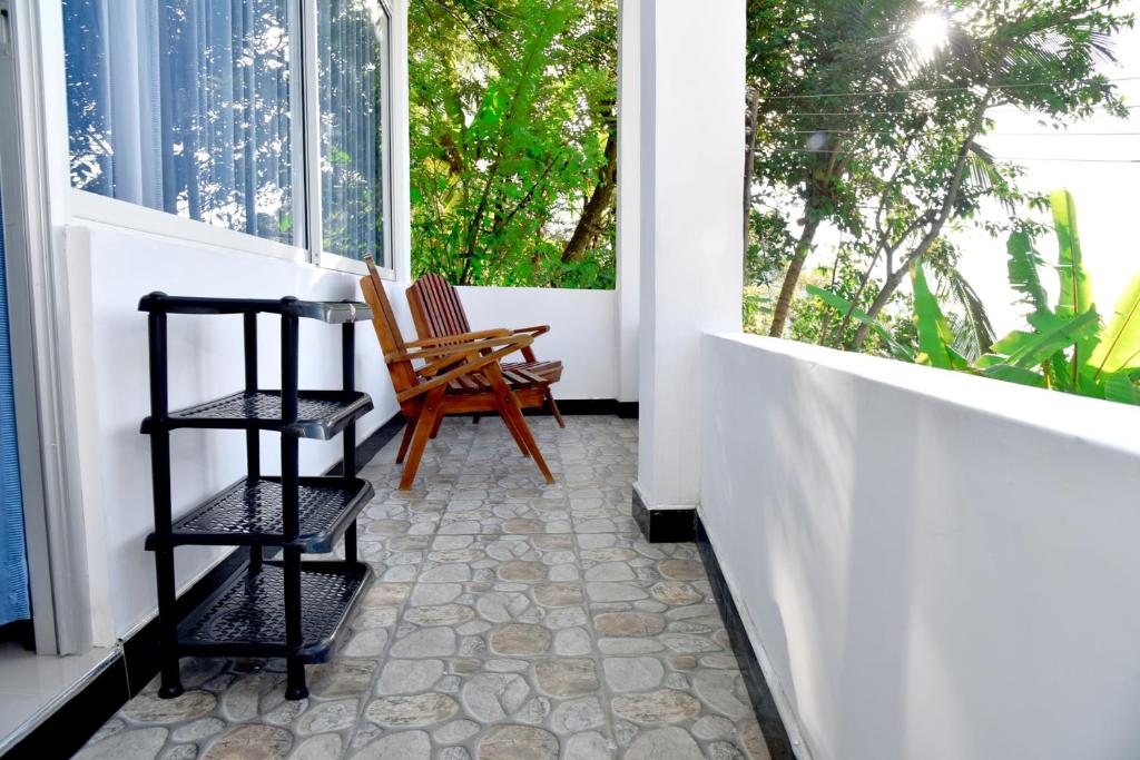 Balkón nebo terasa v ubytování Sunray Homestay