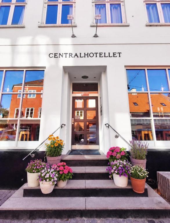 a building with the entrance to the centennial hotel at CentralHotellet in Køge
