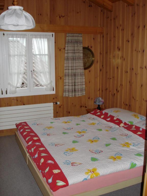 Een bed of bedden in een kamer bij Chalet Spinne