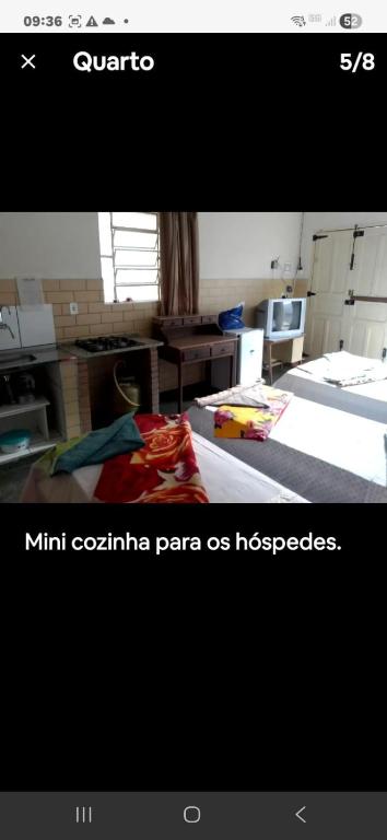 a picture of a living room with a bed at Suave recanto in Ouro Preto