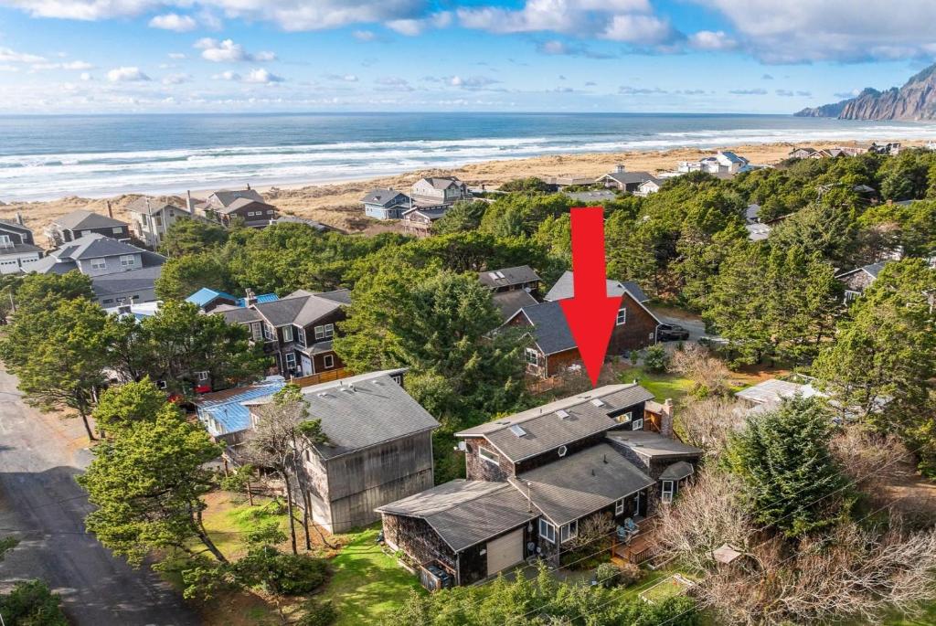 an aerial view of a house with a red arrow on it at After Dune Delight MCA#50643 in Manzanita