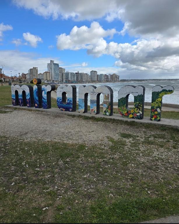 a park with a sign that says troll on the water at Miramar in Miramar