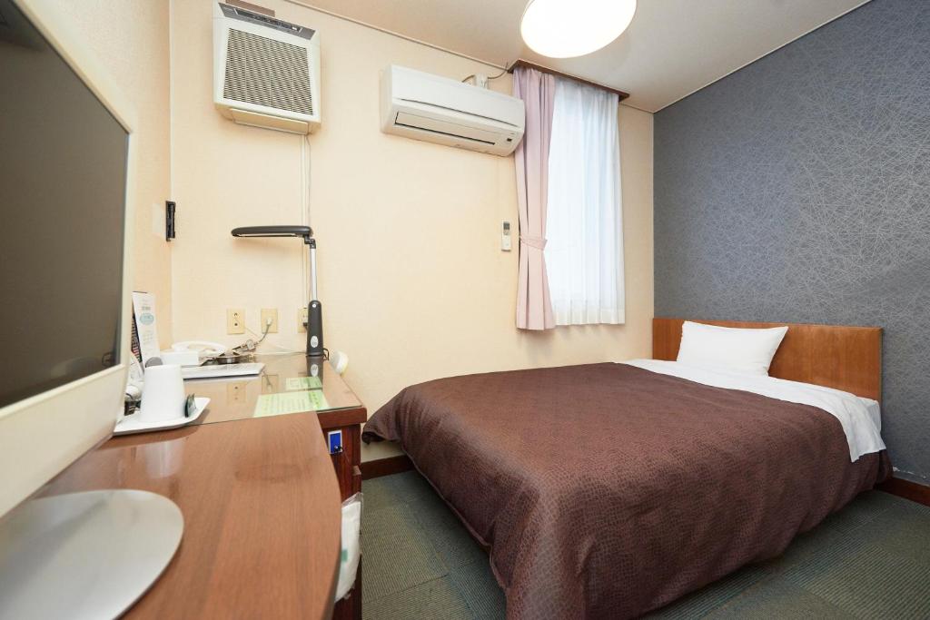 Postel nebo postele na pokoji v ubytování Hotel Select Inn Nishinasuno