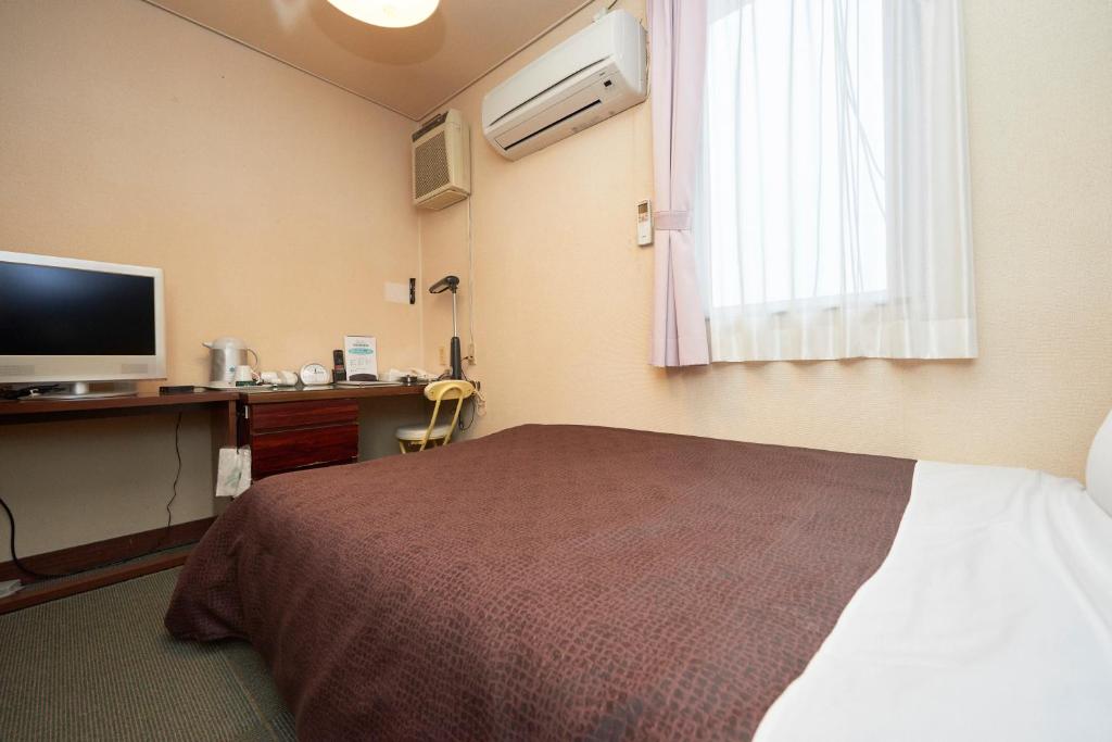 Postel nebo postele na pokoji v ubytování Hotel Select Inn Nishinasuno