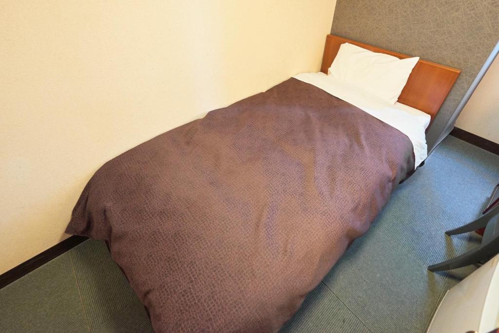 Postel nebo postele na pokoji v ubytování Hotel Select Inn Nishinasuno