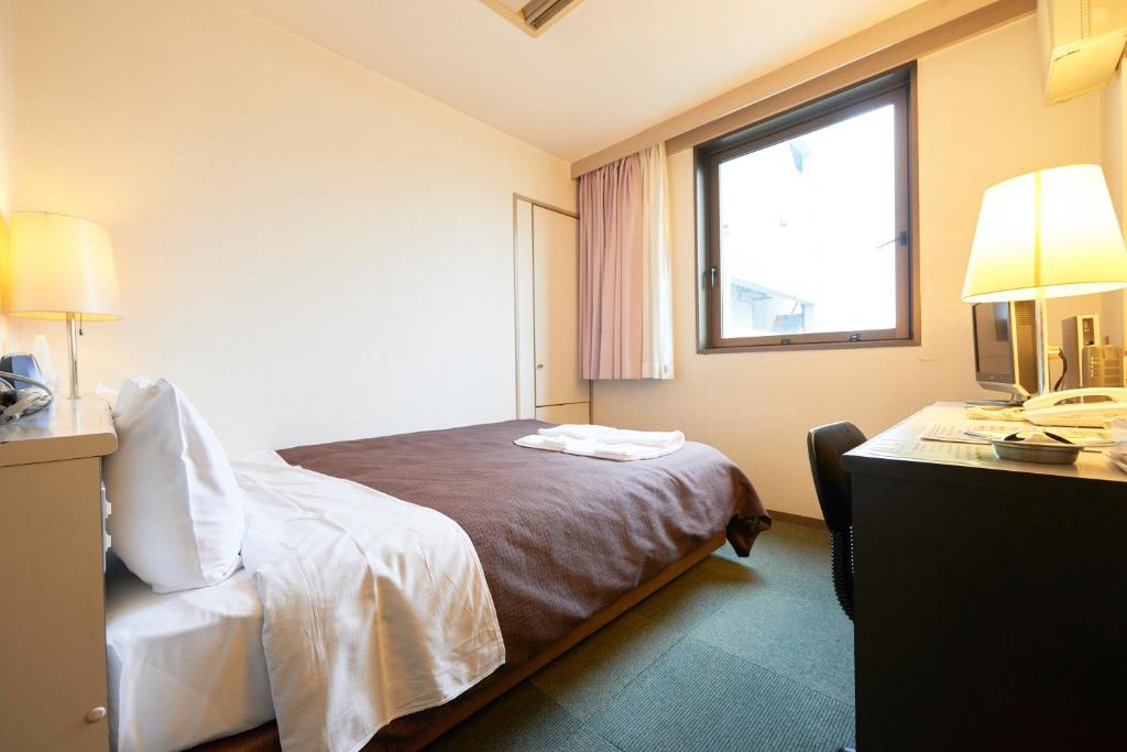Postel nebo postele na pokoji v ubytování Hotel Select Inn Nishinasuno