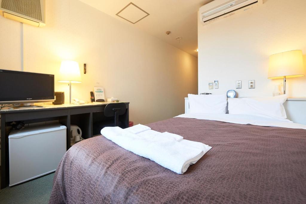 Postel nebo postele na pokoji v ubytování Hotel Select Inn Nishinasuno