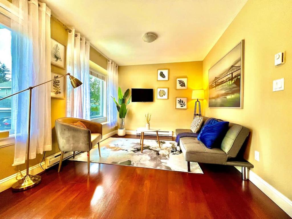 a living room with a couch and a table at The Royal Suite in Surrey