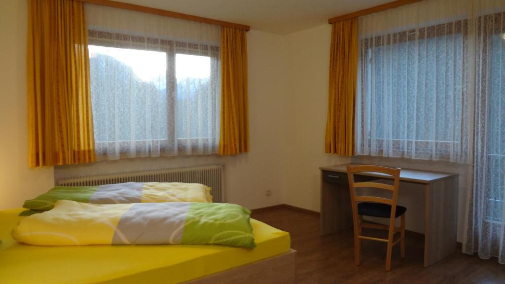 Posteľ alebo postele v izbe v ubytovaní Ferienhaus Willi