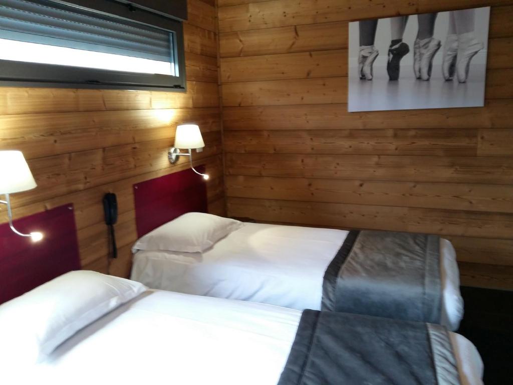 Postel nebo postele na pokoji v ubytování Bio-Motel