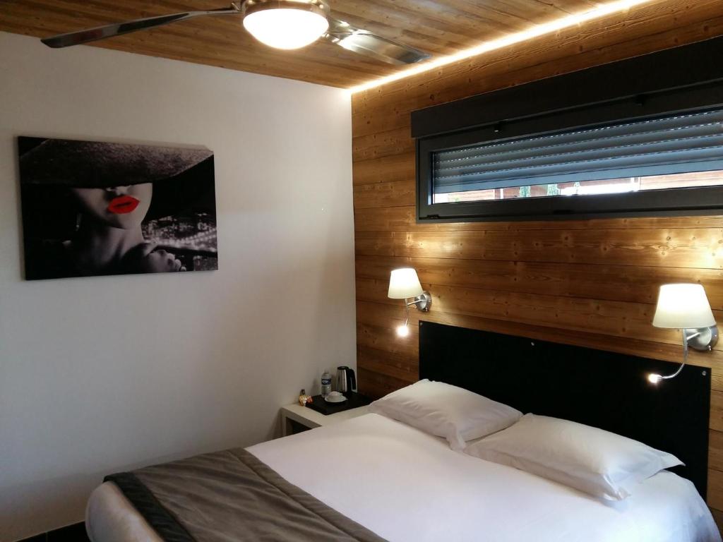Postel nebo postele na pokoji v ubytování Bio-Motel