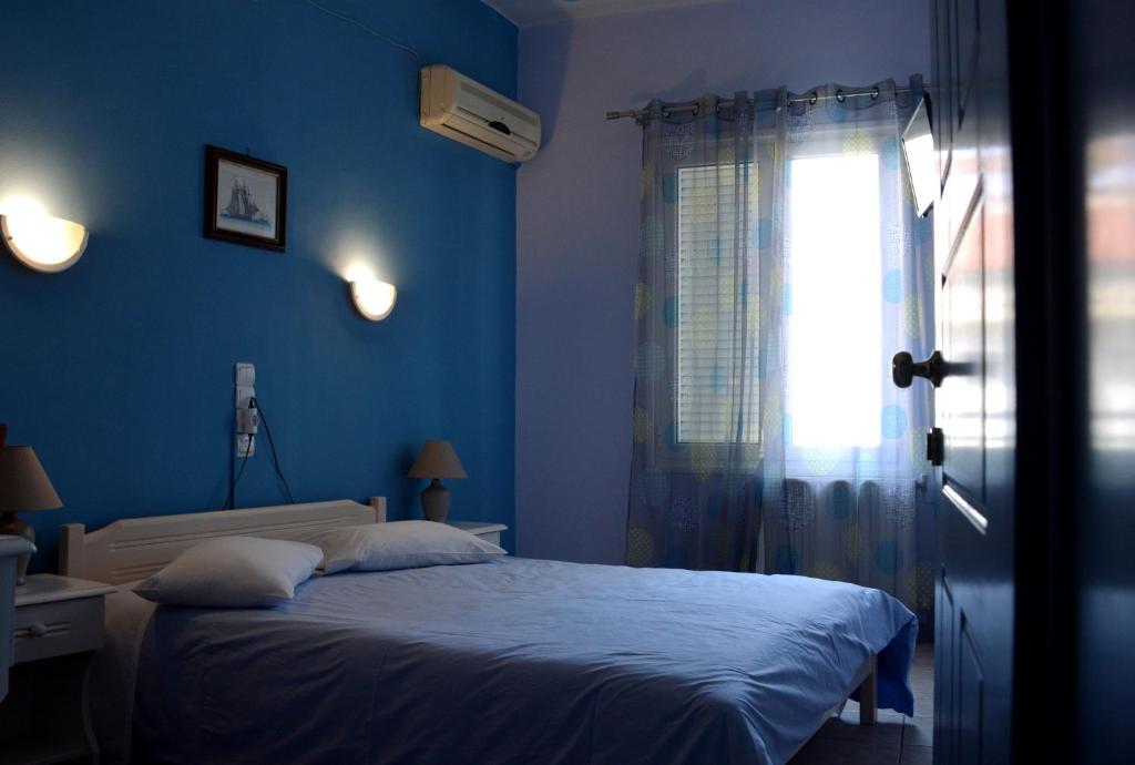 Postel nebo postele na pokoji v ubytování Hera Hotel