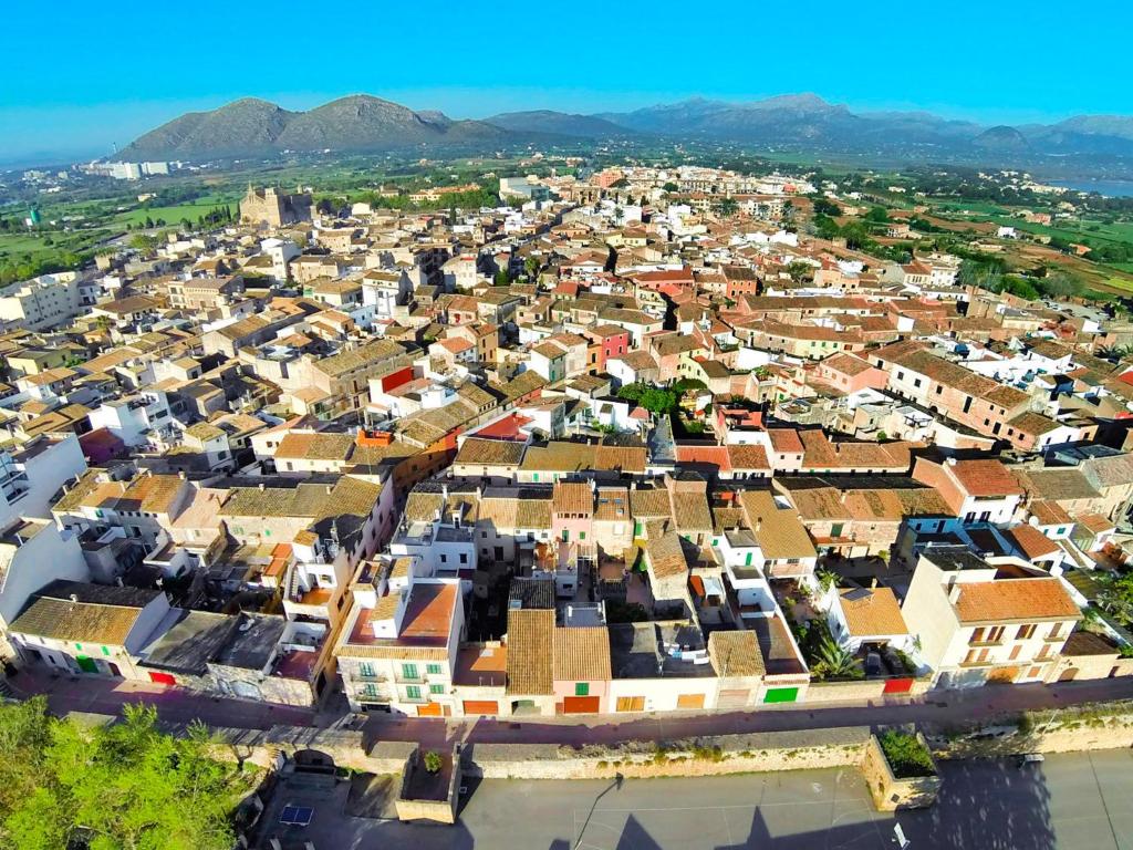 an aerial view of a city with buildings at Fonda Llabres Boutique in Alcudia