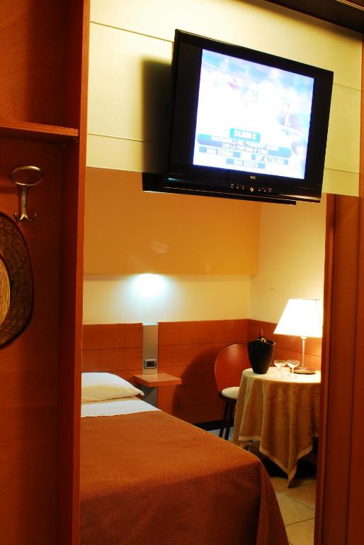 TV a/nebo společenská místnost v ubytování Hotel Club Astor