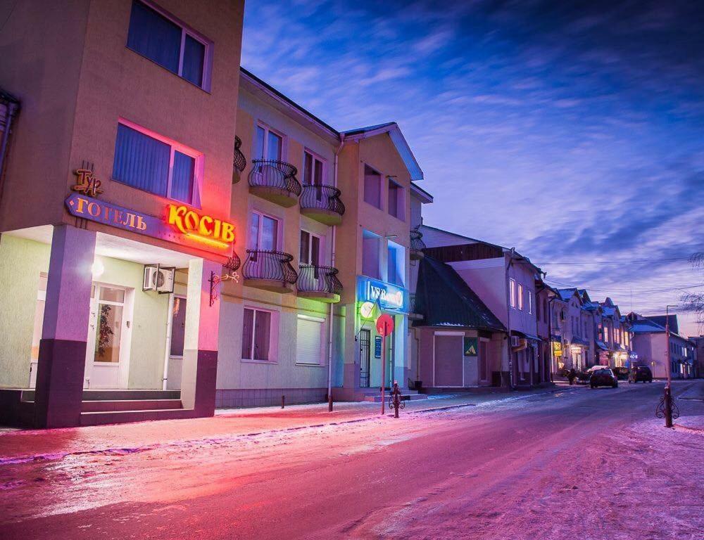 an empty street in a town at night at Tur Gotel Kosiv in Kosiv