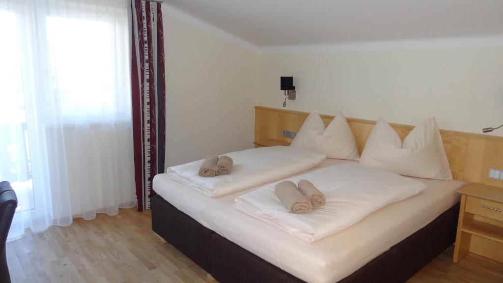 Postel nebo postele na pokoji v ubytování Appartements Gassner