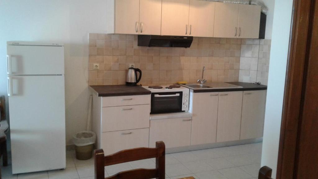 Kuchnia lub aneks kuchenny w obiekcie Harbour View - Oceanis Apartments