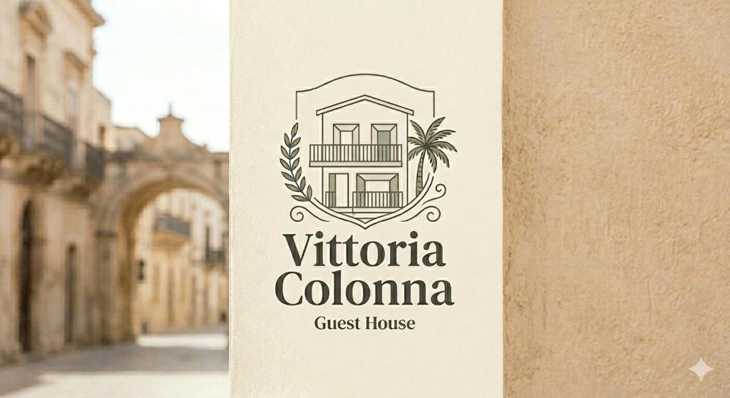 a sign for a villa colombo guest house at Vittoria Colonna in Vittoria