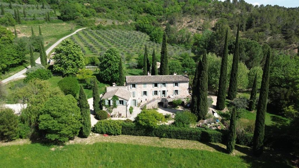 an aerial view of a house in a field with trees at Casa Ostara in Condorcet