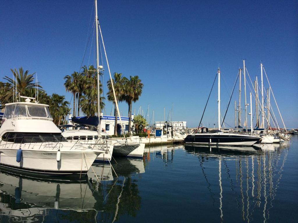 a group of boats docked in a marina at Estepona Port Apartment in Estepona