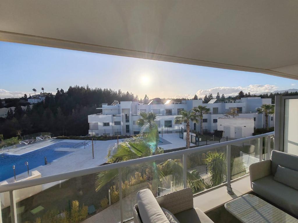 a view from the balcony of a house at Vitta Nature Spa - 3 bedrooms in Mijas Costa