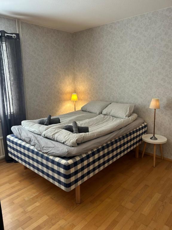 a bedroom with a large bed in a room at Klintvägen 18 E 31 in Mariehamn