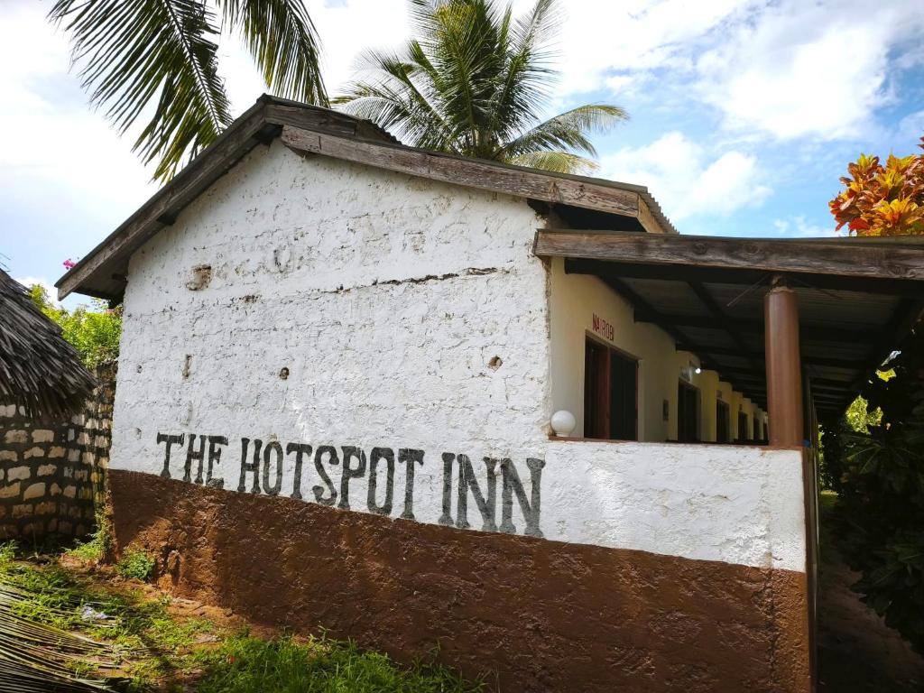 a building with a sign that reads the hostoit inn at HOTSPOT inn - Malindi in Malindi