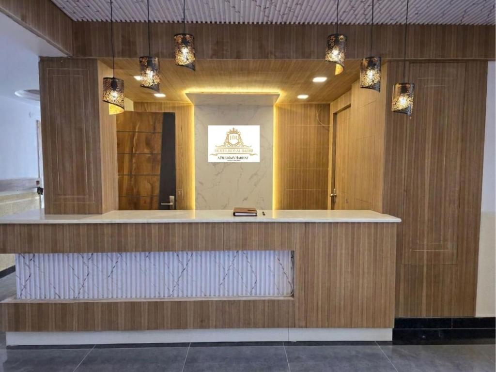 a lobby with a reception counter in a building at Hotel Royal Badri - A Pilgrim's Habitat in Badrinath