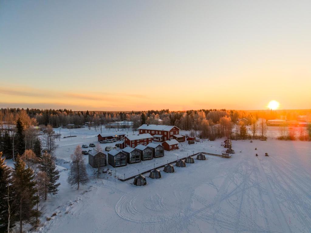 an aerial view of a resort in the snow at Aurora Lake Lodges in Ranua