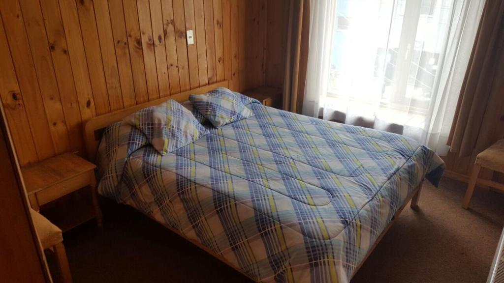 Postel nebo postele na pokoji v ubytování Hostal Costa Azul